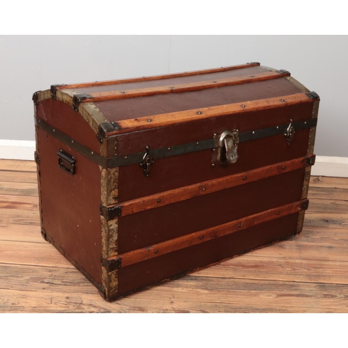 272 - A vintage wood and metal bound steamer trunk. The lock stamped for Eagle Lock Co, USA. W82 x H59 x D... 