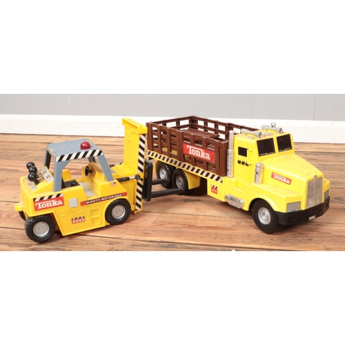 282 - Two Tonka toy trucks. Includes wagon and pallet truck.