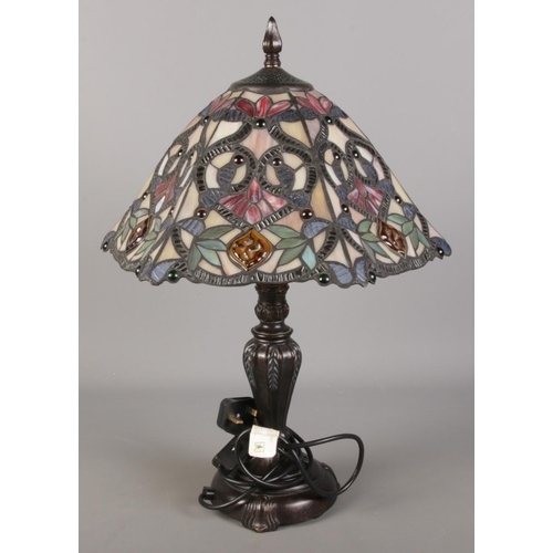 63 - A Tiffany style table lamp. (56cm)