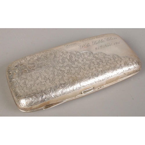 390 - A silver cigarette case. Assayed Birmingham 1901 by  William Hair Haseler. 120g