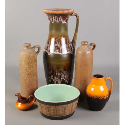 85 - A collection of pottery. Includes large Kingston Pottery drip glaze jug, stoneware bottles, Pearsons... 