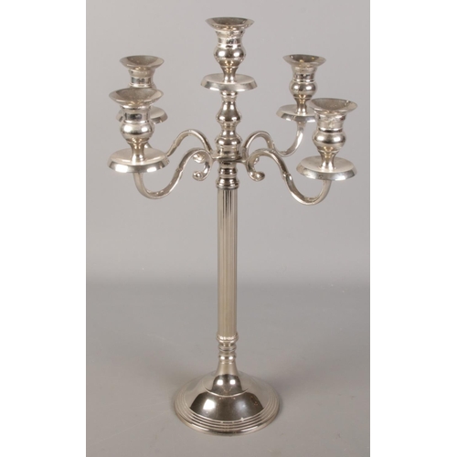 88 - A large silver plate four branch candelabra.