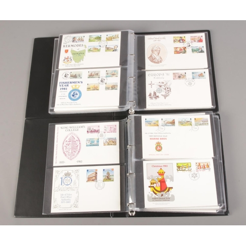 141 - Two albums containing a collection of first day covers, including Isle of Man examples (approximatel... 