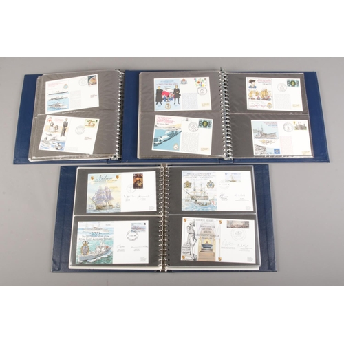 147 - Three boxed albums containing mainly Royal Navy first day covers, with many signed and limited editi... 