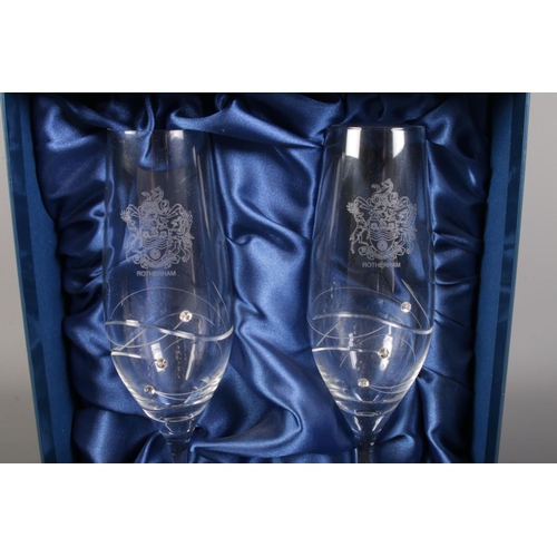 164 - A pair of Diamante champagne glasses, with Rotherham crest, together with an oriental tea set, with ... 