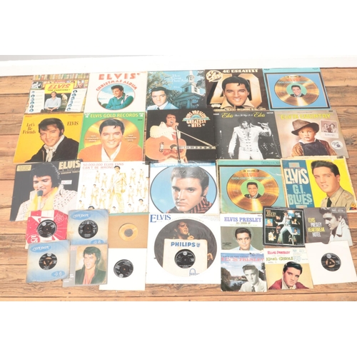 209 - A large collection of Elvis single and album vinyl records, to include Greatest Hits, Elvis Gold, Ar... 