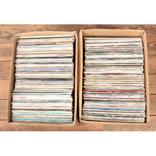 217 - Three boxes of assorted vinyl records, to include Bob Marley, The Police, Bonnie Tyler, The Moody Bl... 