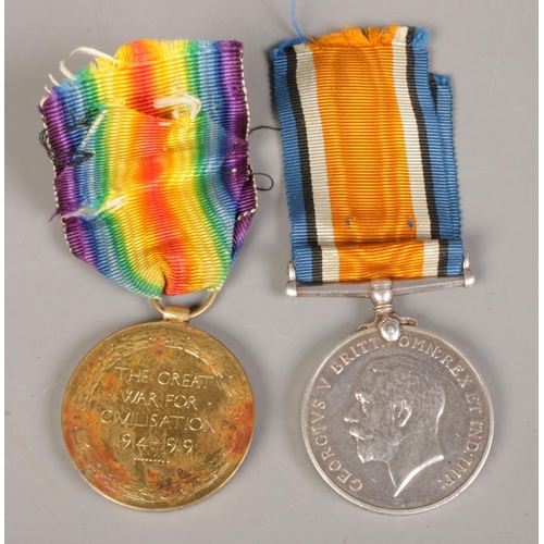 351 - A WWI pair of medals awarded to T4-186406. DVR. R.J. Jenkins.