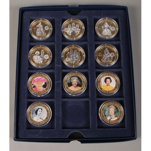 411 - A collection of eleven 24ct gold plated coins, from The London Mint Office and Westminster Collectio... 