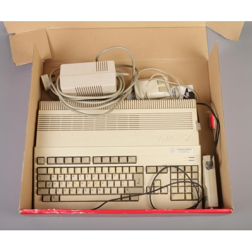 316 - A boxed complete Commodore Amiga 500 console, in Cartoon Classics box.