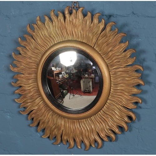 389 - A gilt framed sunburst convex mirror.