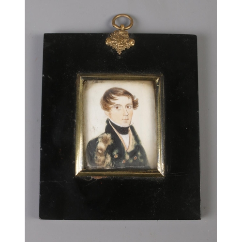 406 - An early twentieth century miniature painting on ceramic tile, depicting a gentleman.