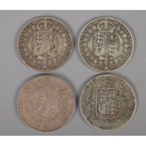 441 - Four silver Victorian half crown coins. Including 1874, 1887,1889 and 1890.