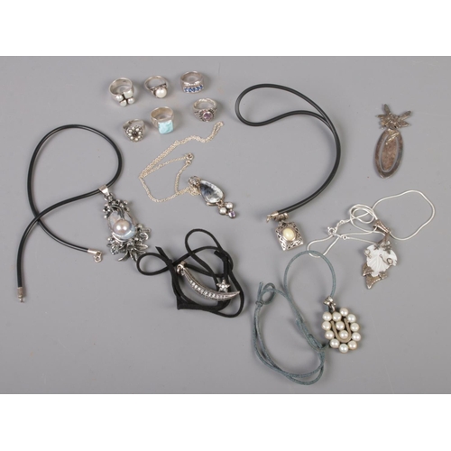 447 - A collection of mainly silver jewellery. Includes bookmark, six dress rings and six pendant necklace... 