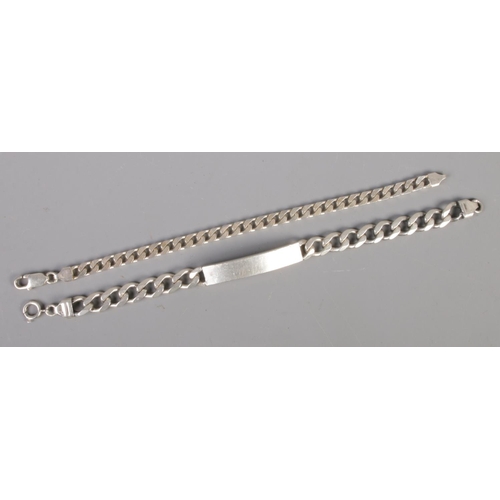 449 - Two silver curb bracelets. 52g.