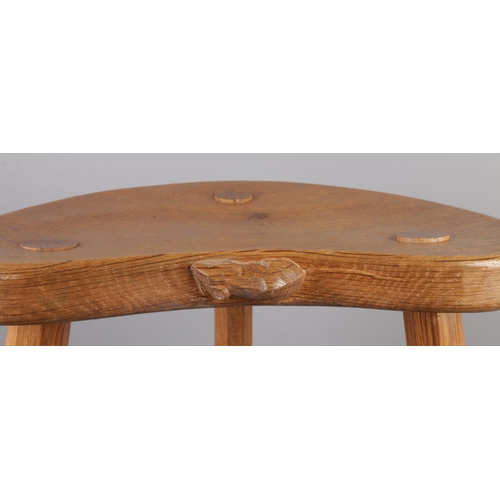 535 - Robert 'Mouseman' Thompson, a carved oak three legged stool with signature mouse.