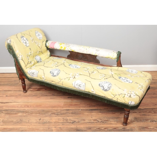 505 - A Victorian chaise long with mahogany frame.