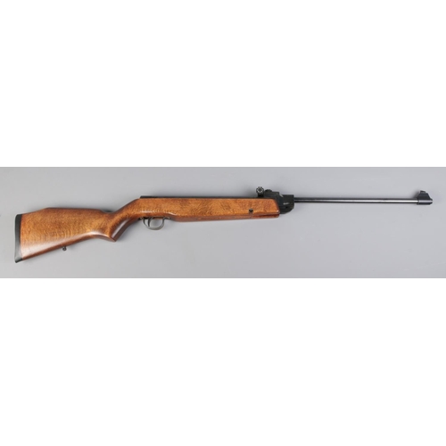 105 - A Webley & Scott Vulcan 0.22 caliber break barrel air rifle. Cocks and fires, with good power. CANNO... 