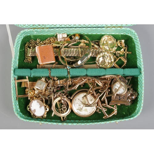 166 - A spoon box containing an assortment of yellow metal items, including cameo brooch, crucifix pendant... 