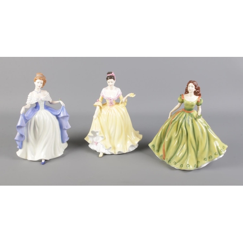 188 - Three Royal Doulton figures including Irish Charm (HN5031), Welsh Beauty (HN5032) and Scottish Pride... 