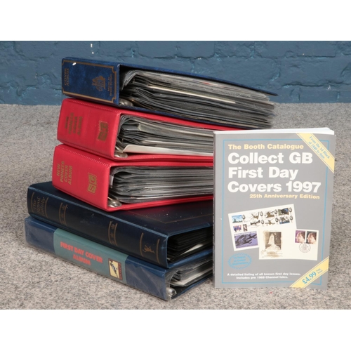 207 - A large quantity of first day covers and commemorative stamps spread across several albums. To inclu... 