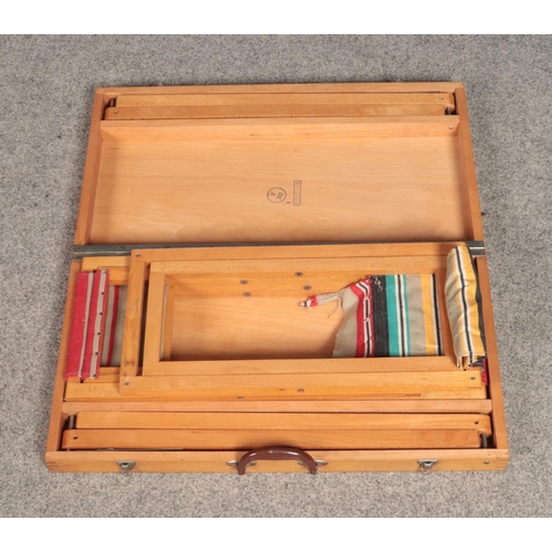 242 - A wooden folding picnic set with table with four fabric stools. One stool is damaged.