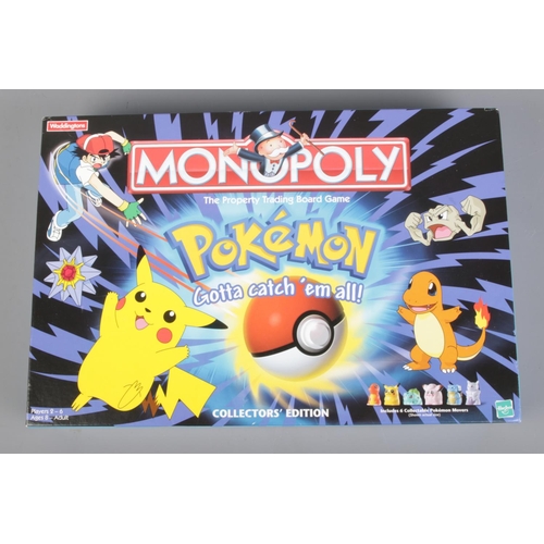 31 - Pokemon Monopoly - Collectors Edition. Boxed and all pieces present.