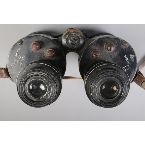 70 - A pair of Bino Prism MK IV military binoculars, bearing broad arrow mark to shoulder, with case.