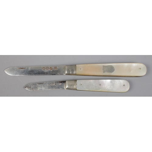 366 - Two silver bladed and mother of pearl fruit knives, including souvenir Wembley 1924 example. Both as... 