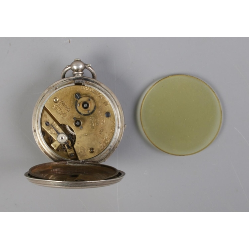 415 - A silver plate H.Samuel pocket watch. Plastic cover is loose.