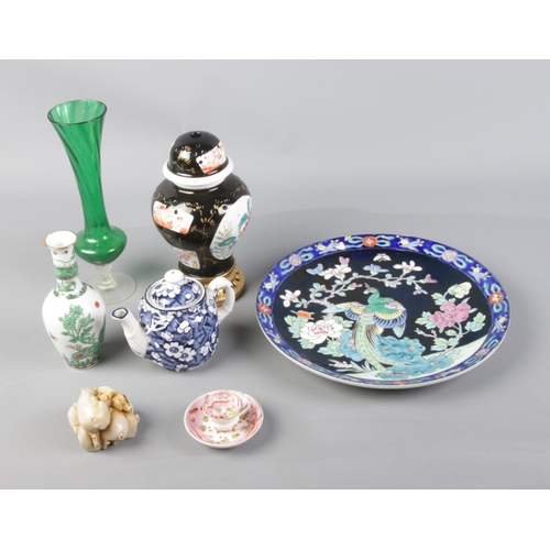 79 - A quantity of assorted ceramics mainly oriental themed including blue and white tea pot and plate wi... 