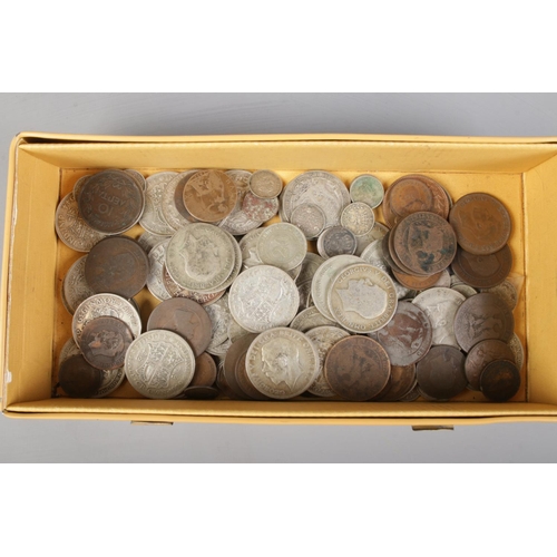 80 - A quantity of mostly 1920s white metal coins. Including half crowns, etc.