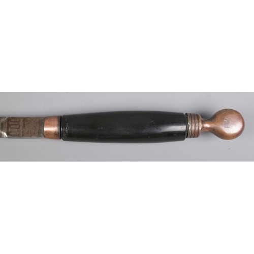 446 - A masonic dress sword, in screw top case, with copper colour pommel and mount and etched blade. Blad... 