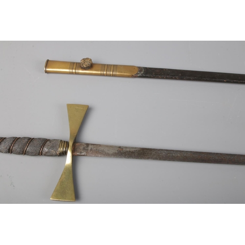 96 - A Masonic ceremonial sword with etched blade and brass cross piece.