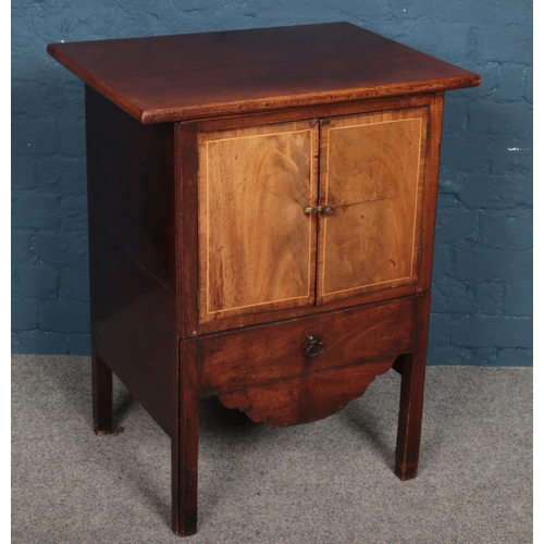 487 - An Edwardian mahogany side cabinet with inlaid decoration to the doors. (84cm x 66cm x 50cm)