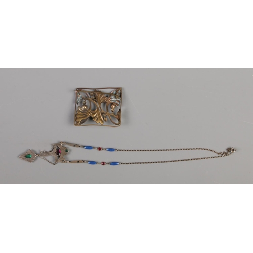 424 - An arts and crafts paste set necklace with pendant, together with an art nouveau brooch of rectangul... 