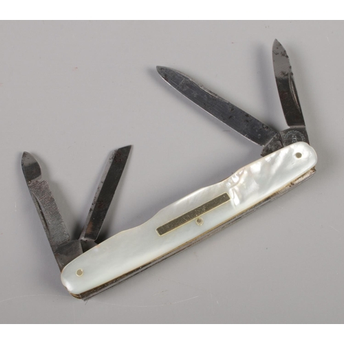 123 - An early 20th century pocket knife with mother of pearl handle by Brookes & Crookes, Sheffield.