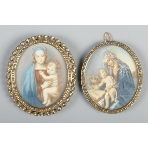 134 - Two oval gilt framed portrait miniatures, both depicting Madonna and child. 6.5cm x 5cm.