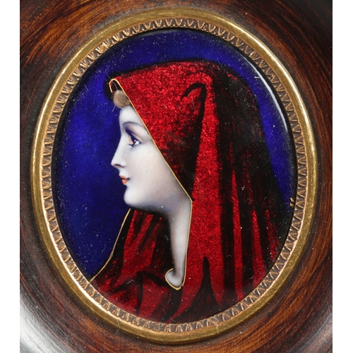 136 - After Jean-Jacques Henner, a framed enamel portrait miniature, portrait of Saint Fabiola. Frame size... 