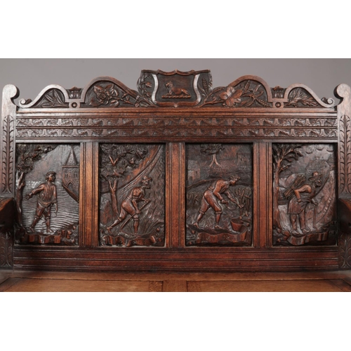 179 - A 19th century extensively carved oak settle. The four back panels depicting farming scenes through ... 