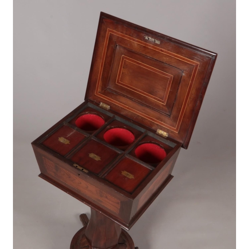 184 - A Victorian mahogany and walnut teapoy.