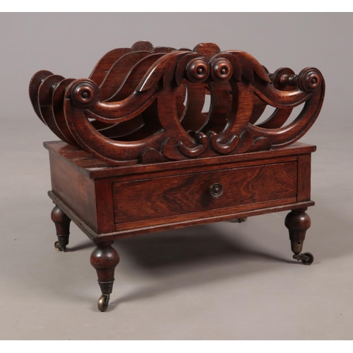 192 - A Regency carved rosewood Canterbury.