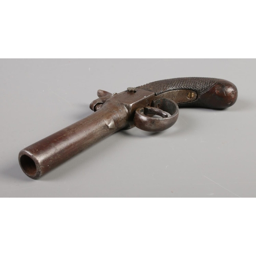 61 - A 19th century percussion cap pistol. Overall length 7.5inch.