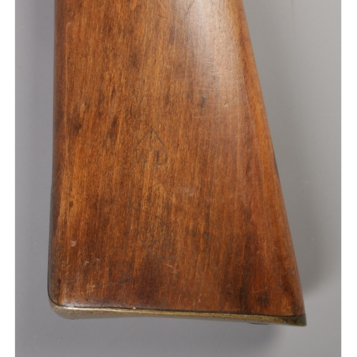 62 - A 19th century Enfield percussion cap two band carbine. Stamped to lock plate with crowned VR and 18... 