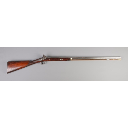 64 - A 19th century percussion cap sporting rifle stamped for William Clarke. Barrel length 32.5inch