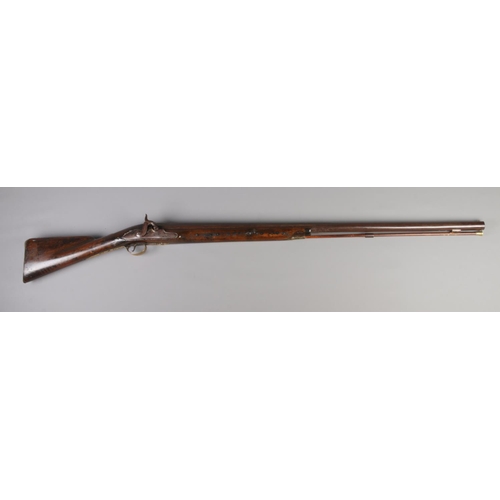 67 - A 19th century Brown Bess musket with percussion conversion. Barrel length 40inch.