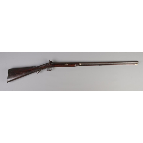 68 - A 19th century percussion rifle stamped for William Burtinshaw. Barrel length 32inch.