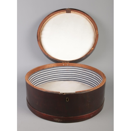 69 - A Georgian mahogany circular box, possibly a hat box. Diameter 41cm.