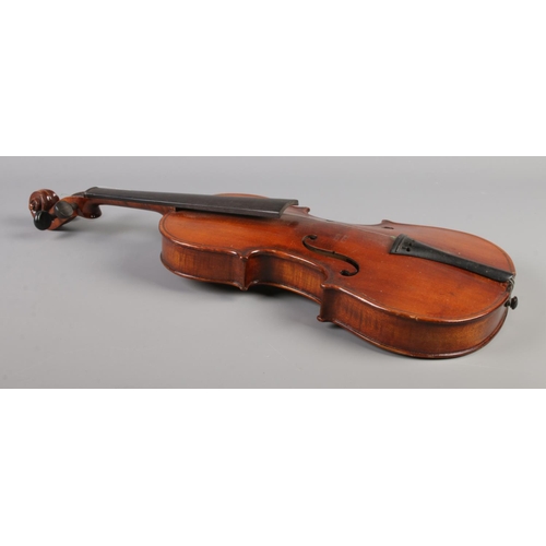 78 - An early 20th century two piece back violin. Labelled The School Violin, Rushworth & Dreaper. 13.5in... 