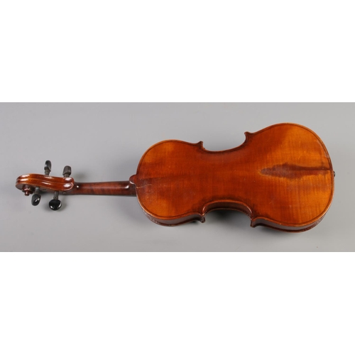 78 - An early 20th century two piece back violin. Labelled The School Violin, Rushworth & Dreaper. 13.5in... 